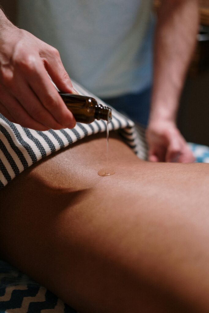 Organic Ayurvedic massage oils and herbal blends used in natural therapy at Shiv Wellness.
